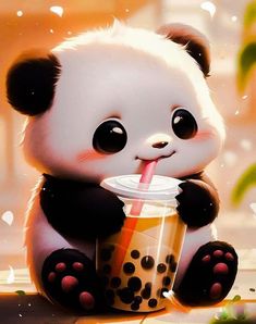 a panda bear sitting on the ground with a drink in it's mouth and drinking from a cup