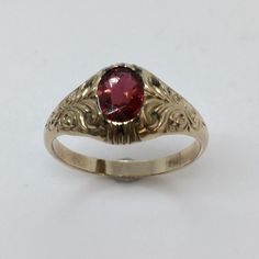 Vintage Antique Victorian Garnet Ring 10K Yellow Gold Hallmarked  Size 11.25, looks never sized Acid tested 10K 3.3 gram Approximately 1/2 inch on top, 3mm wide shank  Oval cut Garnet with minimum abrasion (see pictures) American Antique 1920s Ring, Antique Jewelry Rings, American Antiques, Garnet Ring, Garnet Rings, Antique Victorian, Vintage Watches, Oval Cut, Antique Jewelry