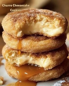 three cookies stacked on top of each other with caramel sauce drizzled over them