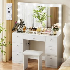 PRICES MAY VARY. Perfect Gift Idea: With its classy looks and practical design, this vanity makes an ideal gift for your wife, daughter or friend on birthdays, holidays, and special occasions. Bright and Adjustable Lighting: This makeup vanity features 14 built-in LED lights with 3 color temperature modes and adjustable brightness, providing you with professional-quality, adjustable lighting for your daily makeup routine. Super Storage: Our vanity desk features 7 large drawers and spacious glass desktop to store all your beauty essentials. Convenient Charging Station: Equipped with 2 standard plug sockets and 2 USB ports, this makeup desk allows for easy charging of hair dryers, curling irons, beauty devices, and phones. Excellent Service: Our makeup table comes with easy-to-follow assembl Vanity With Lighted Mirror, Desk With Glass Top, Bling Bedroom, Vanity Inspo, Modern Makeup Vanity, My Own Room, Beauty Station, Makeup Vanity Desk, Pampering Yourself