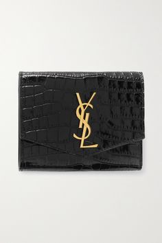 SAINT LAURENT's 'Uptown' wallet has six card slots as well as room for bills, receipts and loose coins - perfect if you find a cardholder too small. It's been made in Italy from croc-effect patent-leather and decorated with iconic gold 'YSL' hardware. Ysl Mini Wallet On Chain, Luxury Wallets For Men, Ysl Wallet, Leather Travel Wallet, Bead Embroidery Patterns, Croc Print, Animal Coloring, Luxury Wallet, Travel Wallets