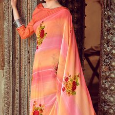 Product Detail - pink-orange colored printed saree with fancy blouse is made chiffon fabric which is highlighted with beautiful floral printed work as shown. Comes along unstitched chiffon fancy blouse piece which you can customise as per your design/style. Occasion - You can wear this saree for casual, outings, social meets and other homely events. Style it up - Look glamorous in this traditional saree by (_PEACHMODE_SAREES_) Pair this saree with Ethnic Gold Jewellery, beautiful clutch to complete the look!! Note:- The actual product may differ slightly in color and design from the one illustrated in the images when compared with computer or mobile screen. Measurements: Saree : Chiffon : 5.5 Mtrs Blouse : Chiffon : 0.8 Mtr Material: Chiffon Stitch Type: Unstitched Country of Origin: India Multicolor Georgette Blouse Piece With Digital Print, Multicolor Digital Print Blouse Piece In Georgette, Pink Georgette Saree With Printed Border, Multicolor Digital Print Georgette Blouse Piece, Bollywood Style Floral Print Georgette Saree, Printed Georgette Saree For Festivals, Printed Georgette Blouse Piece For Saree, Bollywood Georgette Saree With Floral Print, Diwali Floral Print Georgette Blouse Piece