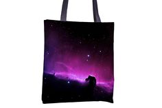 a purple and black tote bag with an image of a horse in the sky