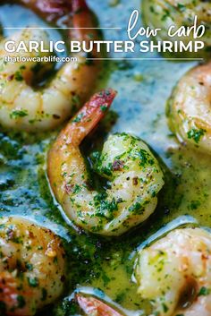 garlic butter shrimp is cooked in a pan and garnished with parsley