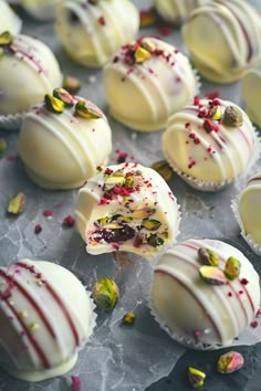 white chocolates with red and green sprinkles on them