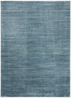 a blue rug with horizontal stripes on the top and bottom, it is very soft