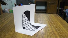 a card with a drawing of a stair case