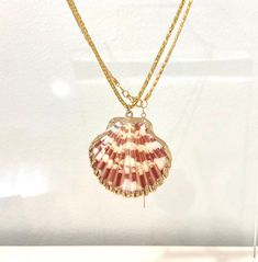 Handmade gold natural shell necklace. Its made with a real calico scallop shell on a gold plated chain.  Please note that shape, color, and size of the natural seashell charm will vary slightly since no two shells are the same  ~Material~ High quality 18k gold plated stainless steel chain. ~Length~ 16 inches can be adjusted to 18 inches. M O R E * I N F O R M A T I O N ~Care instruction~ Please remove it before bathing or swimming. Avoid your jewelry touching chemicals such as hairsprays or perfumes. ~Shipping~ After receiving your order processing time may take 1-2 working days. All the products will be sent via air registered mail / first class international with tracking number. ~Packaging~ All necklaces come in their own jewelry box perfect for gift giving or storage. Thankyou for visi Gift Medallion Necklace With Gold Chain, Round Medallion Necklace With Gold Chain As Gift, Gift Round Medallion Necklace With Gold Chain, Rose Gold Plated Charm Necklaces, Gold Pendant Locket Necklace With Delicate Chain, Rose Gold Plated Pendant Chain Necklace, Gold-tone Chain Necklace With Round Pendant Gift, Gold-tone Round Pendant Chain Necklace Gift, Gold Chain Medallion Necklaces For Gifts