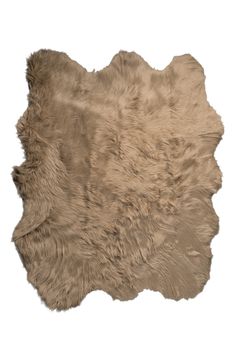 an animal skin rug is shown on a white background