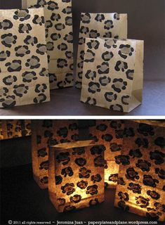 some paper bags that have been made to look like leopard print on them and are lit up