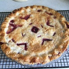 a pie sitting on top of a cooling rack