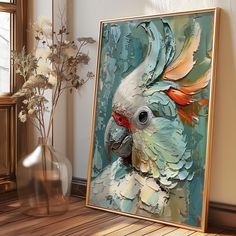 a painting of a white cockatoo on a wall next to a vase with flowers