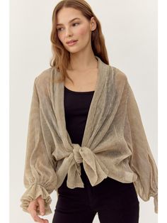 This Jodifl cardigan boasts an elegant, glossy chiffon material and delicate poet sleeves, adding a touch of sophistication to any outfit. The self-tie front allows for a customizable fit while maintaining a sheer, lightweight feel. Perfect for layering or wearing on its own for a chic, polished look. Details:- Glossy Chiffon Fabric- Poet Sleeves- Tie Front- Sheer, Lightweight Fabric Content:- 100% Polyester Black Date Night Outfit, Poet Sleeve, Sheer Cardigan, Chiffon Cardigan, Black Dating, Nashville Style, Tie Front Cardigan, Bride Accessories, Chiffon Material