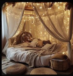 a bed covered in lights and pillows under a canopy