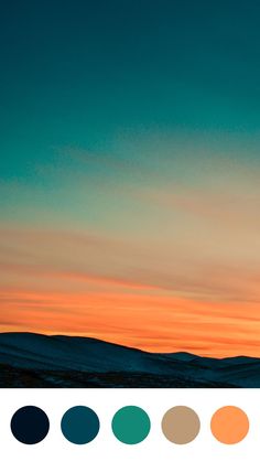 an orange and blue sky with some clouds