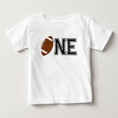 One football boy first birthday baby t-shirt. Birthday Football Shirt, Football First Birthday Outfit, Football One Year Old Birthday Shirt, Casual T-shirt With Number Print For First Birthday, Short Sleeve T-shirt With Text Print For First Birthday, Football Boys, Boy First Birthday, Baby Tshirts, Hat Crafts