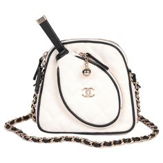 Chanel White Quilted Canvas & Black Calfskin Leather Mini Crossbody Tennis Bag Model- Mini Crossbody Tennis Bag Product Type- Crossbody, Shoulder Serial Number- XJ****** Age- Circa 2023 Accompanied By- Chanel Dust Bag Colour- White Hardware- Gold Material(s)- Canvas Limited Edition- ✔ Height- 12cm Width- 13cm Depth- 4cm Strap Drop- 55cm Interior- White Textile Closure- Zip Country of Origin- France Condition Rating- Excellent Exterior Condition- The exterior is in excellent condition with light signs of use. Interior Condition- The interior is in excellent condition with light signs of use. Hardware Condition- The hardware is in excellent condition with light signs of use. Corner Condition- The corners are in excellent condition with light signs of use. Chanel Luggage, Chanel Crossbody Bag, White Textile, Chanel Crossbody, Chanel White, Tennis Bag, White Quilt, Mini Crossbody, Leather Mini