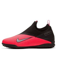 a red and black shoe with the word nike written in silver on it's upper part