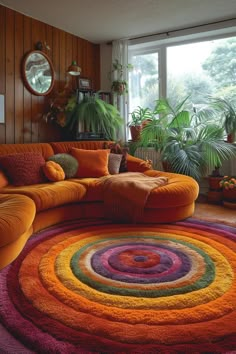 a living room filled with furniture and lots of plants on the wall next to a large round rug