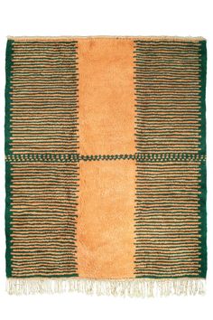 an orange and green striped rug with fringes