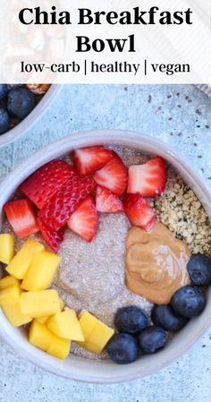 chia breakfast bowl with strawberries, blueberries and mangoes in the middle