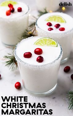 three glasses filled with white christmas margaritas