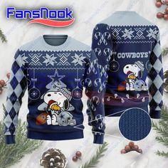 a sweater with the image of snoopy and peanuts on it, surrounded by pine cones