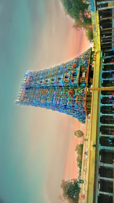 an aerial view of the eiffel tower with cars parked on it's sides