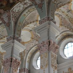 an ornately decorated ceiling in a building