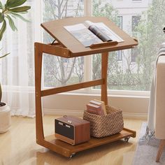 a small wooden table with a magazine rack on it