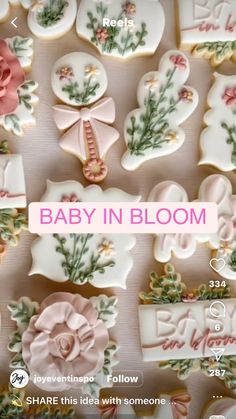 baby in bloom cookies are displayed on a table