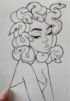 a drawing of a woman with snakes on her head