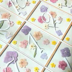 paper flowers are laid out on the table