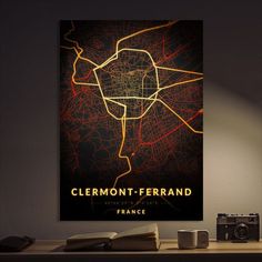 a black wall with a map of the city of lermont - ferrard