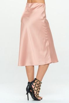 Made in USA Solid Stretch Satin Midi Skirt. Fabric content: 97% Polyester, 3% Spandex. Available in other Colors. Style: casual, formal, work Print / Pattern: solid Silhouette: pencil skirt Fit: fit Length: knee-length Lining: no Made In: Made in U.S.ASize Measurement (inch): S: 13.5 (Waist), 18.5 (Hips), 29.3 (Length) M: 14.5 (Waist), 19.5 (Hips), 29.8 (Length) L: 15.5 (Waist), 20.5 (Hips), 30.3 (Length) Elegant Pink Pencil Skirt For Spring, Feminine Formal Satin Skirt, Formal Feminine Satin Skirt, Feminine Satin Skirt For Formal Occasions, Feminine Pencil Mini Skirt For Spring, Feminine Long Fitted Pencil Skirt, Feminine Spring Mini Pencil Skirt, Feminine Mini Pencil Skirt For Spring, Spring Feminine Mini Pencil Skirt