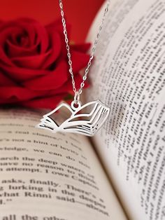 This beautiful necklace is a special and unique piece of jewel for you your best friends and a perfect gift for all books lovers. It is made entirely of solid stainless steel in the shape of a open book. The chain is resizable/adjustable. Stainless steel never fade or change color. Product details: Material: Stainless Steel Color: Silver Size: 20mm * 15mm Chain lenght: 45cm Book Lover Jewelry, Lover Jewelry, Book Necklace, Book Jewelry, Her Book, Custom Book, Open Book, Story Book, Beautiful Necklace