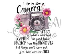 a camera with pink flowers and the words life is like a camera