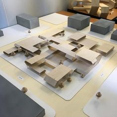 an architectural model is displayed on a table