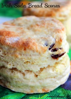 two biscuits stacked on top of each other with the words irish soda bread scones