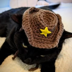 - crochet brown cowboy kitty hat, handmade by me :) - my kitty loves it and so will yours, makes your cat look like they're about to challenge you to a dual - one size should fit all cats, but if your cat is smaller or larger than normal, feel free to dm me with a custom order with my email below!! - measures about 4.5 inches in length, 3.5 inches in width, and one inch in height - made from 100% acrylic yarn and felt details - feel free to email me at sonyastitches00@gmail.com - free shipping, US only - made with love <33 Crochet Hat For Cats, Crochet Cat Accessories, Crochet Hat For Cat, Crochet Pet Accessories, Crochet For Cats, Crochet Cowboy Hats, Cat Hat Pattern, Crochet Brown, Cat Hats