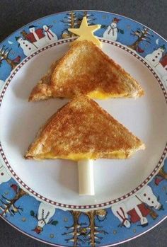 two pieces of toast on a blue and white plate