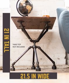 a table with a globe on top and the words 21 5 in wide below it