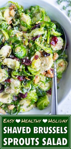 a white bowl filled with shaved brussels sprouts salad