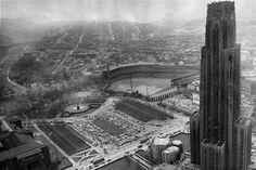 an aerial view of a city with tall buildings