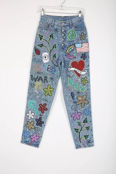 jeans; denim; hand painted jeans; one of a kind fashion; vintage fashion; vintage jeans; straight jeans; paint; psychedelic; colorful; funky; Retro Multicolor Denim Jeans, 70s Painted Jeans, Vintage Cotton Jeans With Patches, Vintage Blue Jeans With Patches, Hand Painted Denim Jeans For Streetwear, Funky Jeans, Hand Painted Jeans, Vintage Edit, Painted Jeans