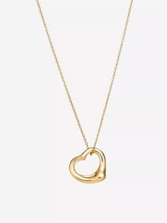 Designed by Elsa Peretti, the Open Heart necklace from Tiffany & Co celebrates love. Crafted from 18-carat yellow gold, it’s punctuated with a dangling heart charm on the cable chain and fastens through a lobster-clasp closure. If you ask us, we think that it makes the perfect gift for loved ones – or, you know, yourself works too (there’s no judgement here). Team yours with the matching bracelet. Gold Necklace Tiffany, Gold Necklace Tiffany And Co, Tiffany Gold Necklace, Tiffany And Co Heart Necklace, Tiffany And Co Gold, Tiffany Heart Necklace, Elsa Peretti Necklace, Gold Open Heart Necklace, Heart Necklace Tiffany