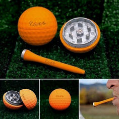 an orange golf ball with a marker in its mouth next to a yellow golf ball