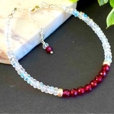 Elegant Handmade Beaded Bracelet Made With Natural Genuine Gemstone And Hypoallergenic Metals. Details: Handmade In Pennsylvania, Usa. Gemstone: 4mm Red Garnet Micro Faceted & Rainbow Moonstone With Blue Flashy Colors. Metal: Available In Solid Sterling Silver As In Pictures Or Made To Order In 14k Gold Filled Bracelet Size: 6.5” Inches Plus 1” Inch Extender Chain. If You Don’t Want The Extender Please Let Me Know. * Garnet Is January Birthstone. * Moonstone Is June Birthstone. January Birthstone Jewelry, Beads Bracelet Design, Sterling Silver Jewelry Handmade, Coral And Gold, Moonstone Bracelet, Natural Stone Bracelets, Bracelets Diy, Enamel Bracelet, Silver Charm Bracelet