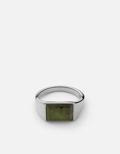 The men's Lennox Jasper Ring features jasper set in a sterling silver band. Inspired by the 70s with emphasis on the horizontal stone and thin band, this piece adds subtle retro flair to any look. Please note: Color and markings may vary. [tab]Specifications[/tab]Base Metal: Sterling SilverPlating: Polished PlatinumMaterial: Jasper Green StoneDimensions: L: 12.5mm W: 9.5mmGauge: 2.78mmStone Count: 1Carat Weight: 7.5 Mens Designer Jewelry, Stones Rings, Gold Pinky Ring, Medical Wallpaper, Mens Silver Jewelry, Rings Men, Green Ring, Jasper Ring, Ring Inspo