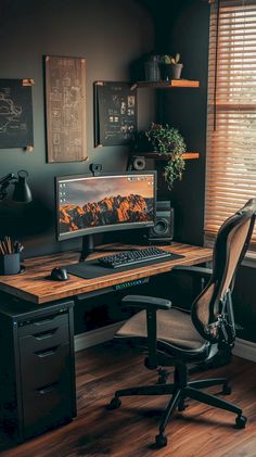 a desk with a computer on top of it in front of a window and wooden floor